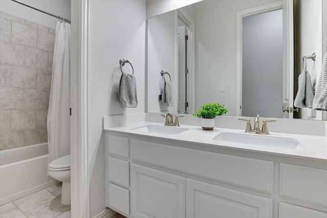 full bathroom featuring toilet, shower / tub combo, and vanity