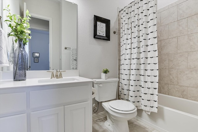 full bathroom with toilet, shower / bath combo with shower curtain, and vanity