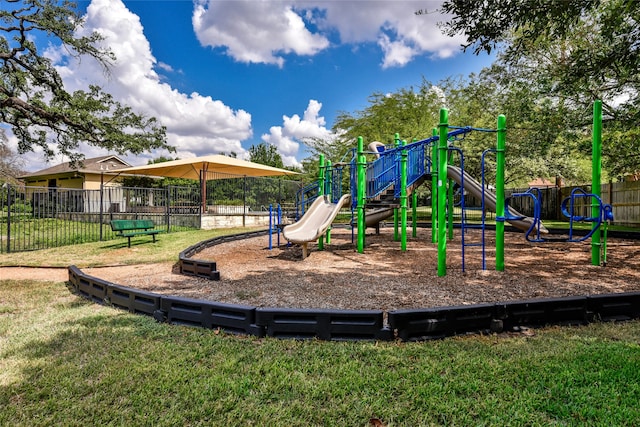 view of jungle gym featuring a yard