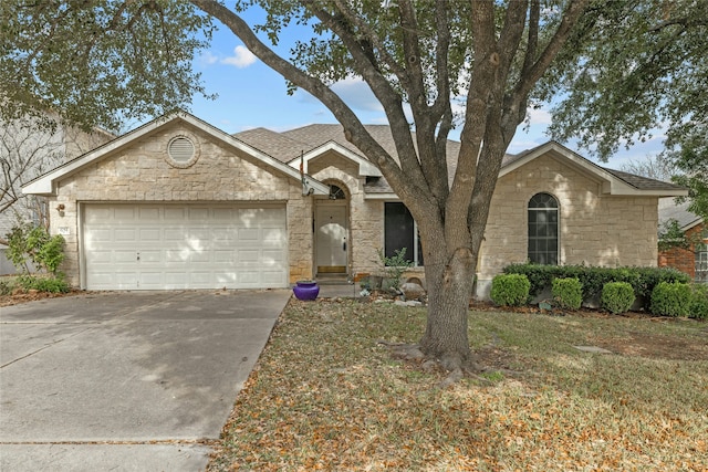 single story home with a garage