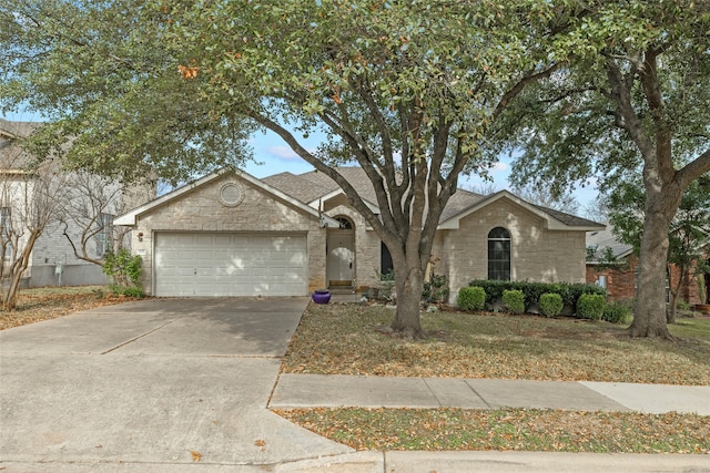 ranch-style home with a garage