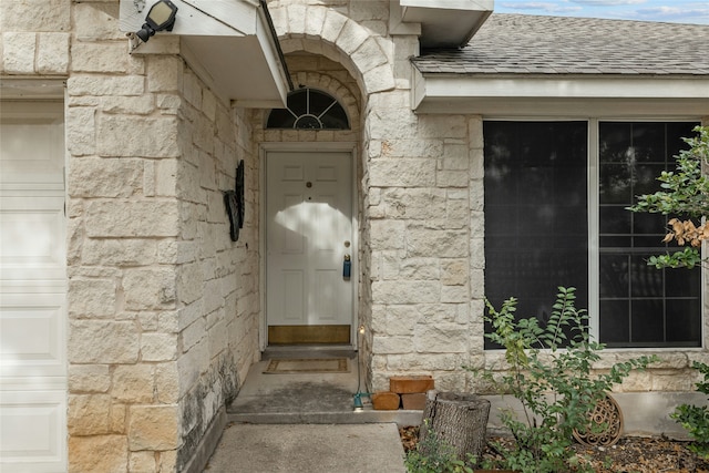 entrance to property featuring a garage