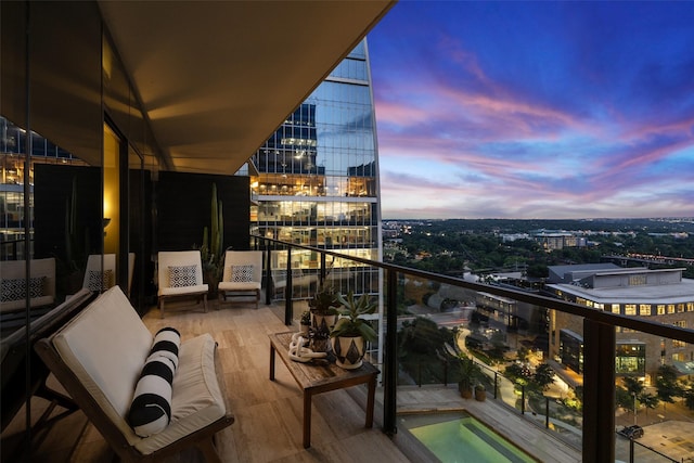 view of balcony at dusk