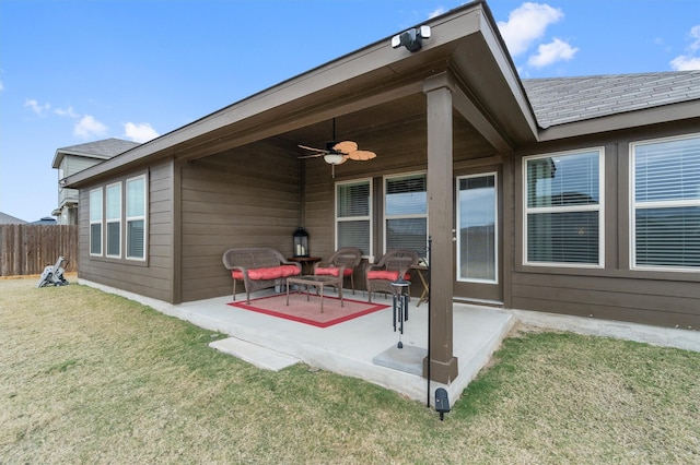 exterior space with ceiling fan