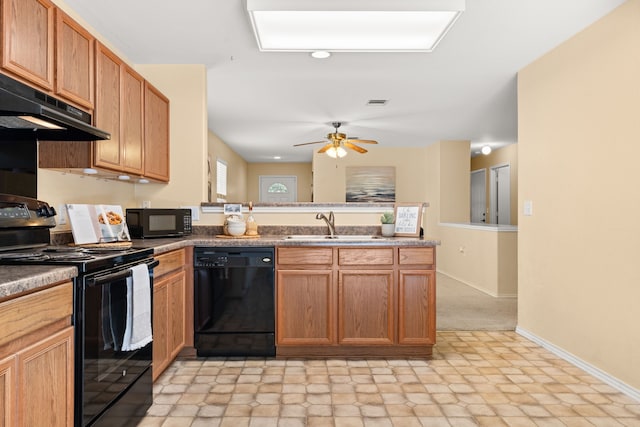 kitchen with sink, light carpet, ceiling fan, and black appliances