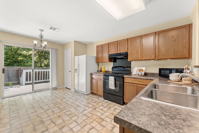 kitchen featuring sink, an inviting chandelier, pendant lighting, exhaust hood, and black appliances