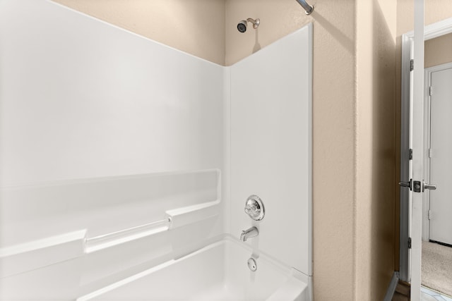 bathroom with shower / bathing tub combination