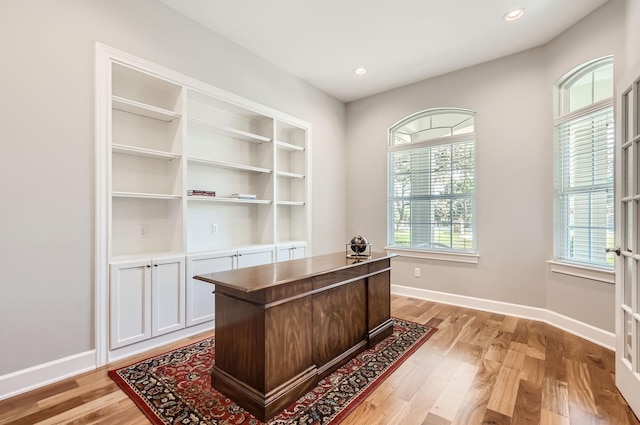 office area with light wood-type flooring