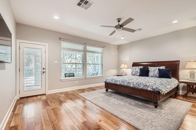 bedroom with ceiling fan, access to exterior, and light hardwood / wood-style flooring