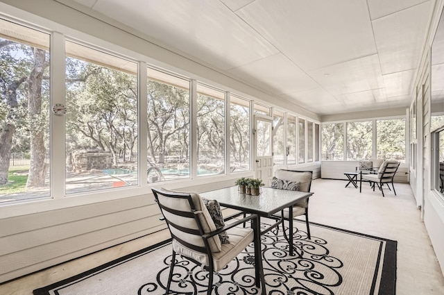 sunroom featuring plenty of natural light