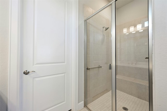 bathroom with an enclosed shower