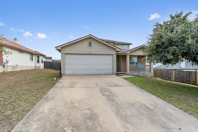 single story home featuring a garage, a porch, and a front lawn