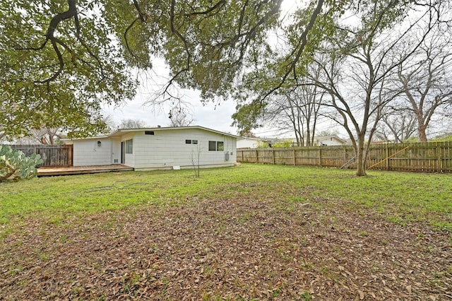 view of yard with a deck