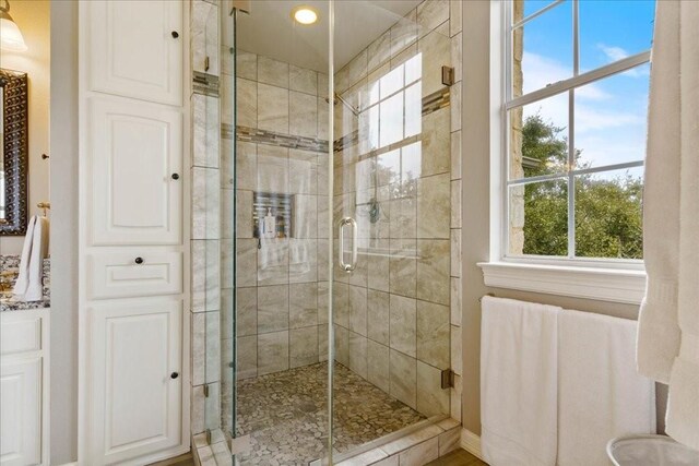 bathroom with walk in shower