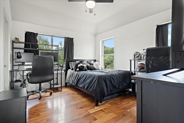 bedroom featuring ceiling fan and hardwood / wood-style floors