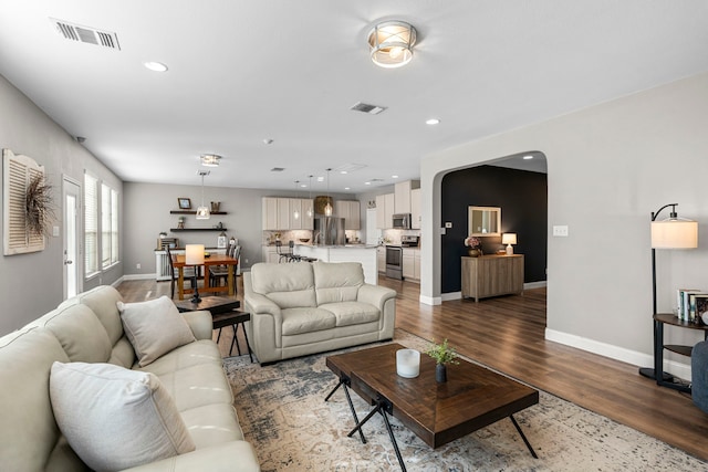 living room featuring wood-type flooring