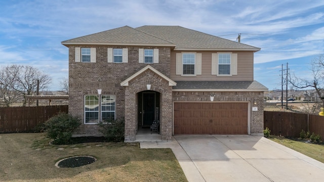 view of front facade with a front lawn and a garage