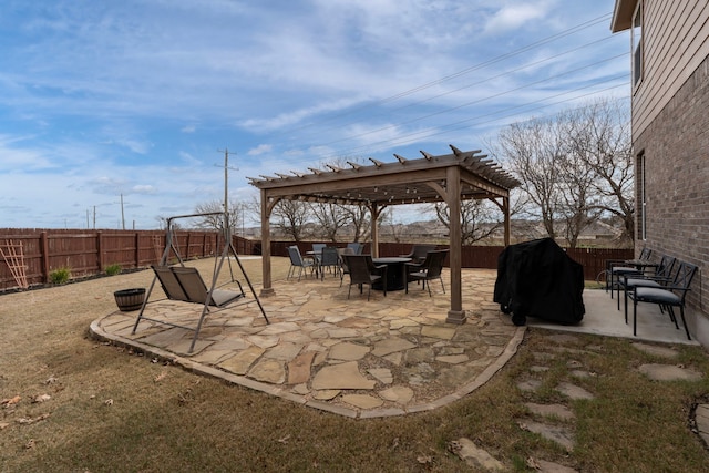 view of patio featuring a pergola