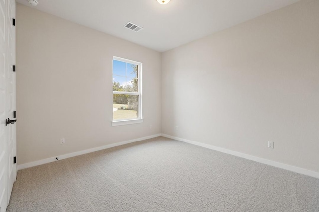 unfurnished room with carpet flooring