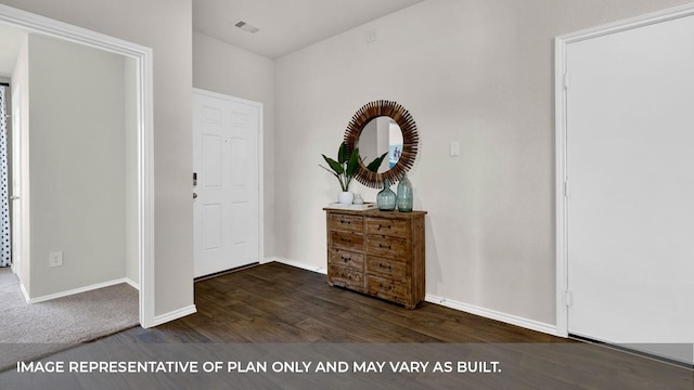 entryway with dark hardwood / wood-style floors