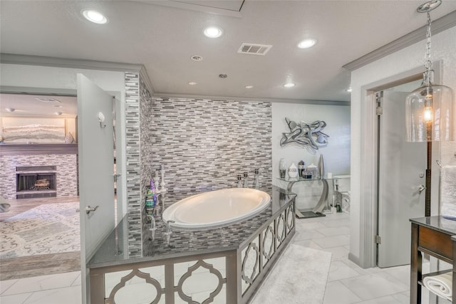 bathroom featuring a bath, ornamental molding, and toilet