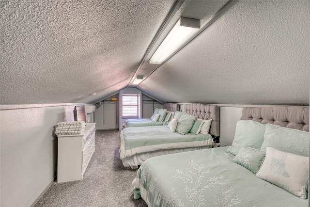 carpeted bedroom featuring lofted ceiling