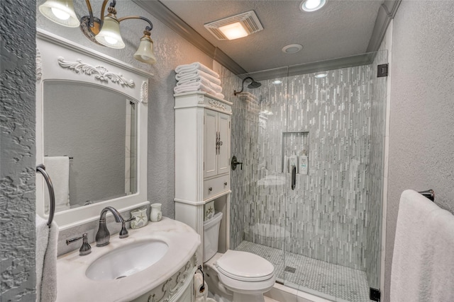 bathroom featuring sink, a shower with door, a textured ceiling, and toilet