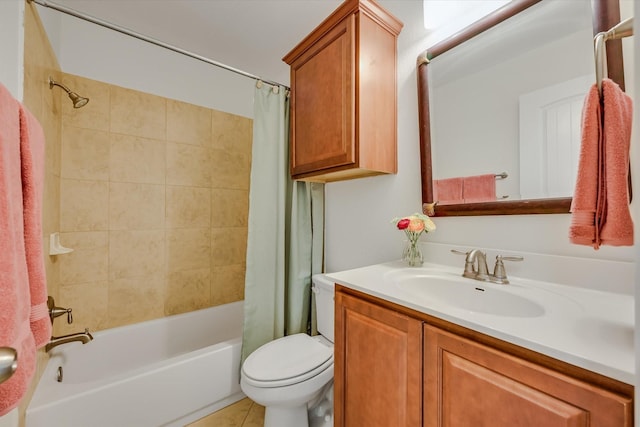 full bathroom featuring toilet, tile patterned floors, shower / bath combo, and vanity