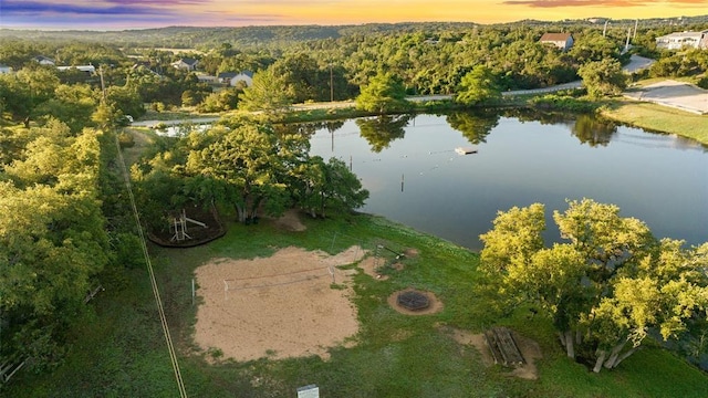 aerial view at dusk with a water view