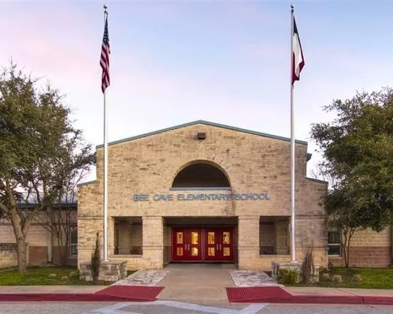 view of outdoor building at dusk