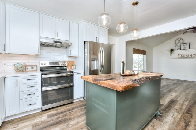 kitchen with stainless steel appliances, white cabinets, hanging light fixtures, and a center island