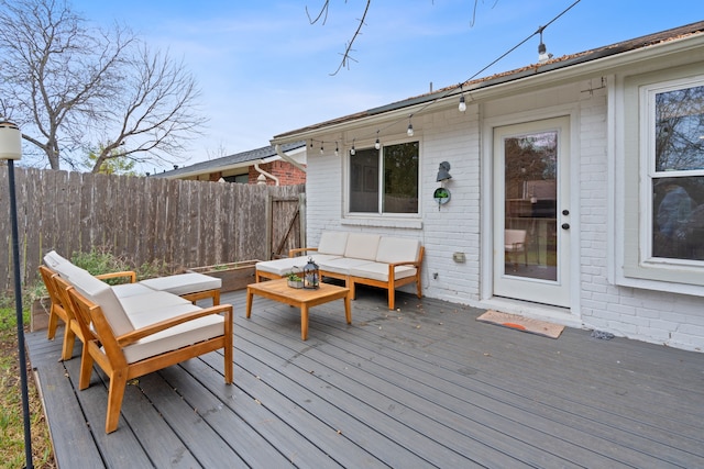 wooden deck featuring an outdoor hangout area