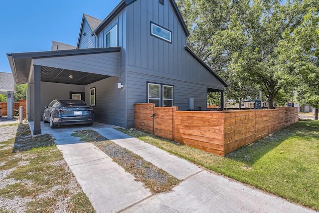 view of property exterior with a carport