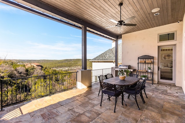 view of patio with ceiling fan and grilling area