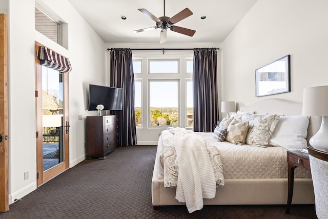 carpeted bedroom featuring access to outside and ceiling fan