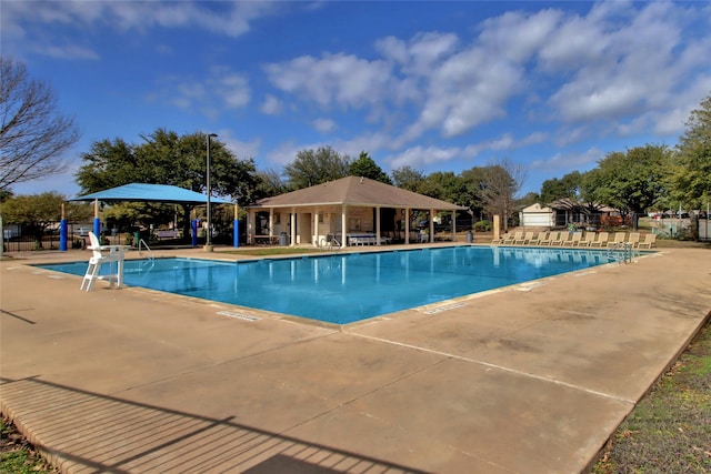 view of pool with a patio and a gazebo