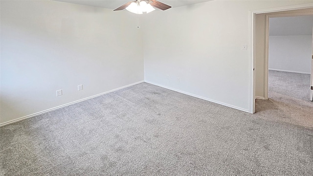 empty room with carpet flooring and ceiling fan