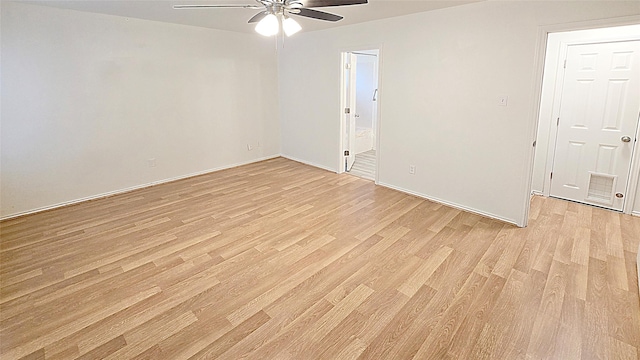 unfurnished room with ceiling fan and light hardwood / wood-style flooring