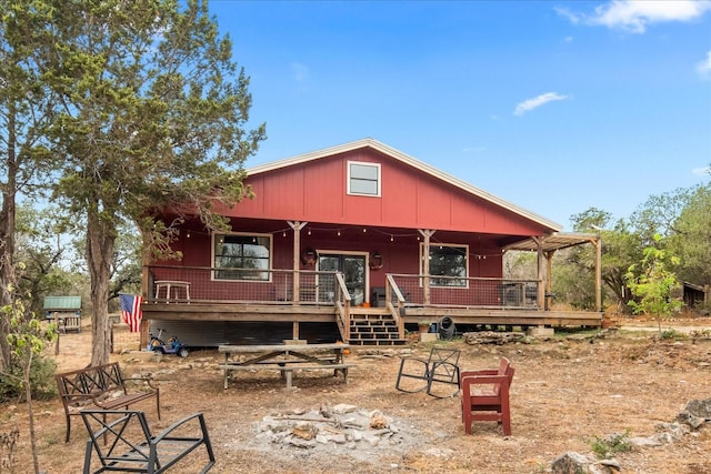 rear view of house with a deck