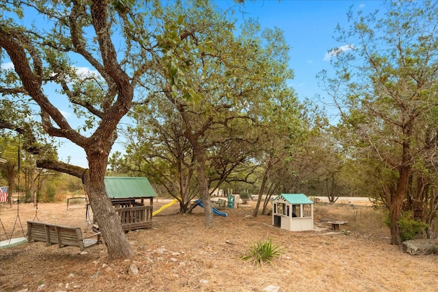 view of yard featuring a playground