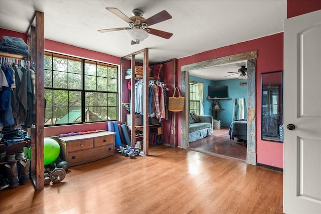 interior space with hardwood / wood-style flooring and ceiling fan