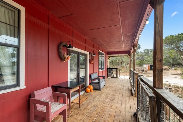 wooden deck featuring a porch