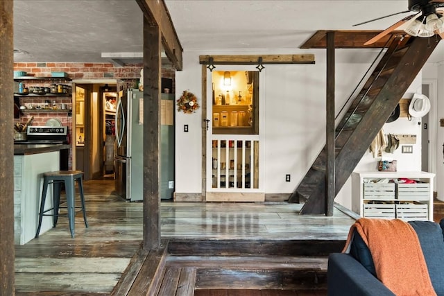 interior space featuring ceiling fan