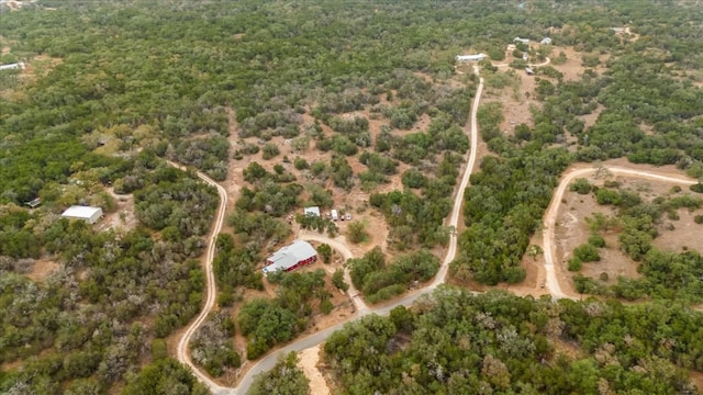 aerial view featuring a view of trees