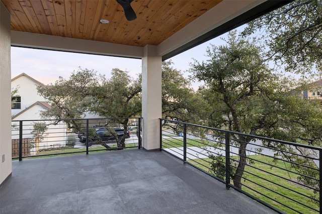 balcony at dusk with ceiling fan