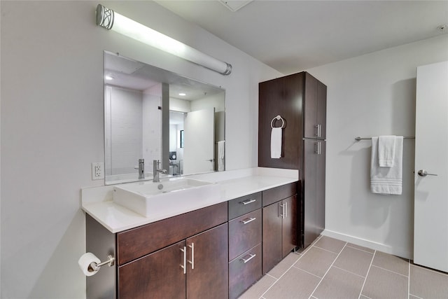 bathroom featuring tile patterned floors and vanity