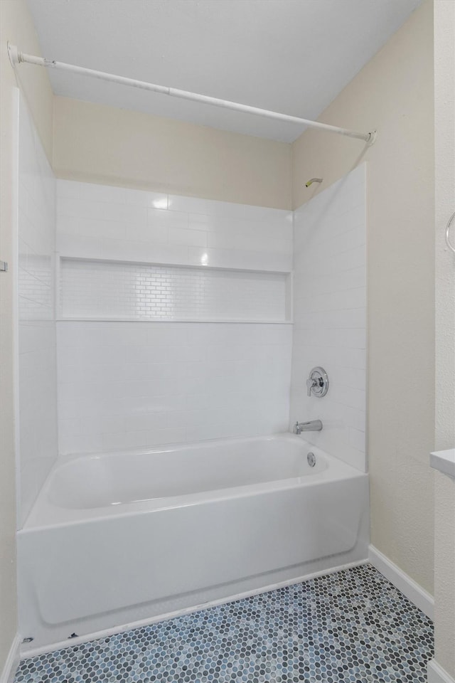 bathroom with shower / bath combination