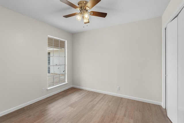 unfurnished bedroom featuring ceiling fan, a closet, and light hardwood / wood-style floors