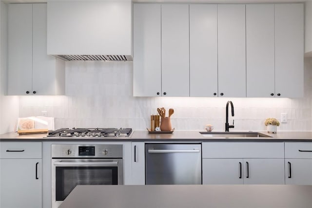 3008 Sorin St, Austin, TX 78723 - kitchen with stainless steel appliances, a sink, custom range hood, and backsplash