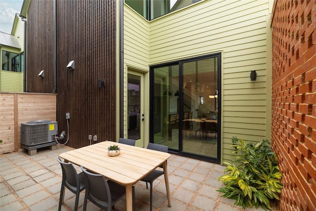 3008 Sorin St, Austin, TX 78723 - view of patio / terrace with fence, central AC unit, and outdoor dining area